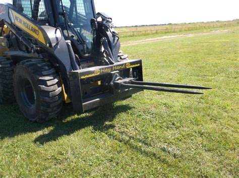 hay unroller skid steer|6' bale unroller.